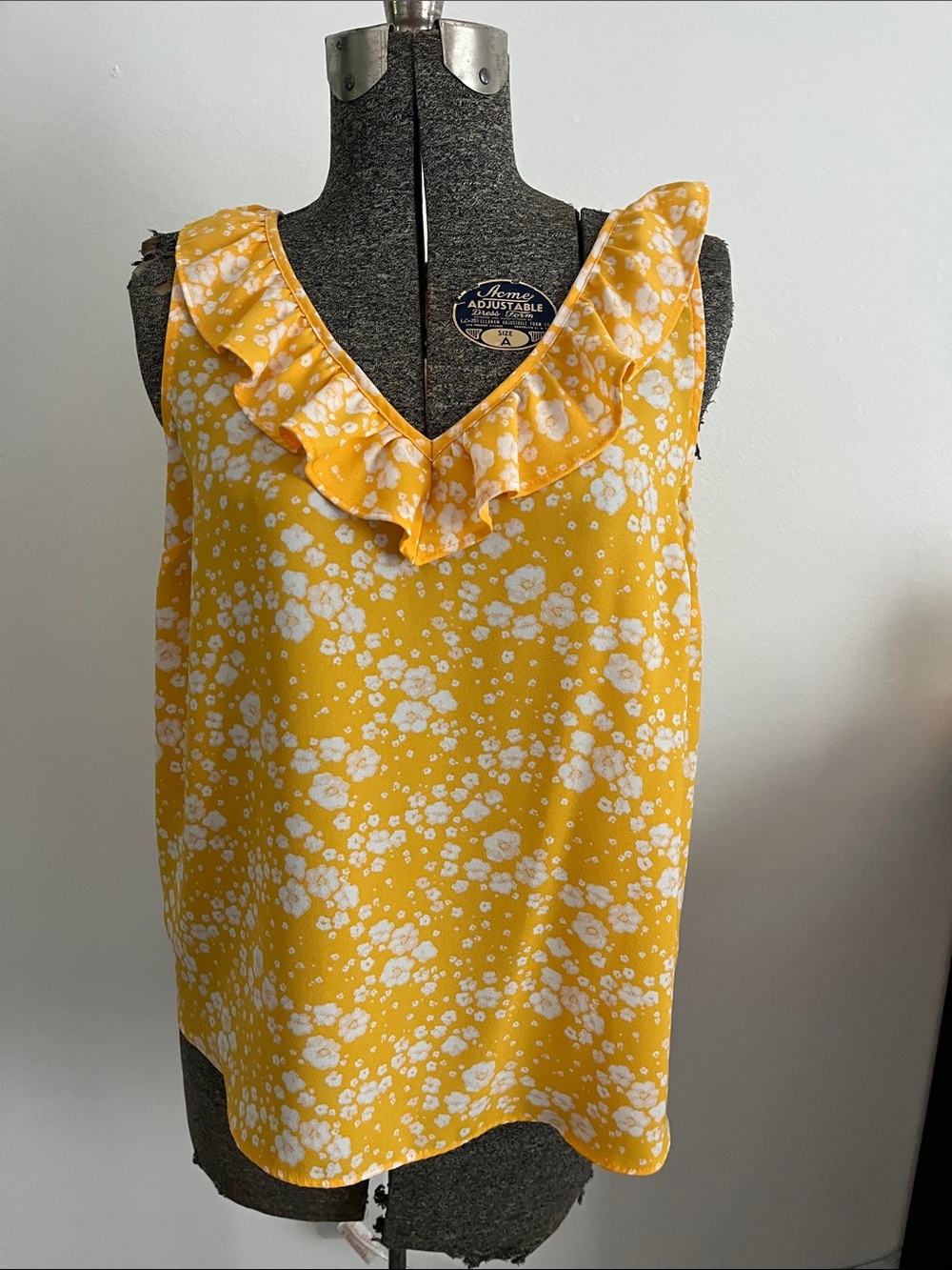 LC Lauren Conrad Yellow and White Floral Ruffle V-Neck Tank